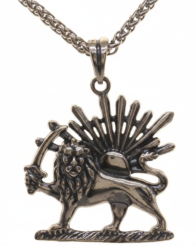 Silver lion pendant with chain on a white background