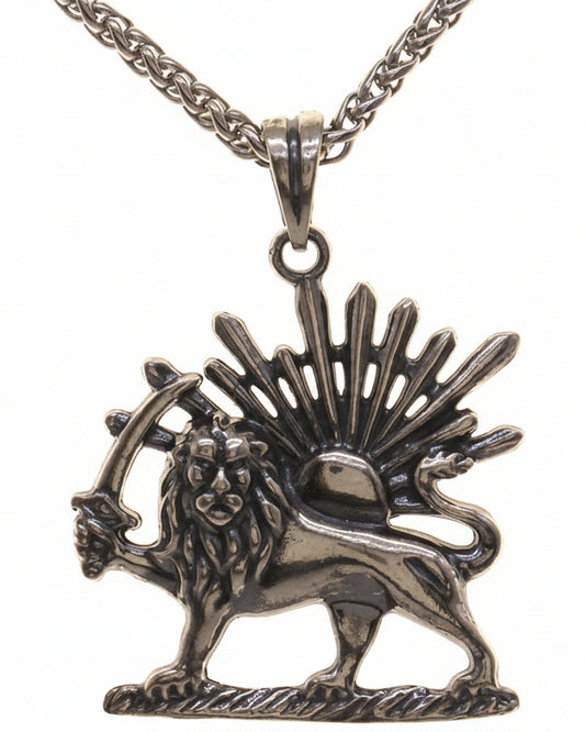 Silver lion pendant with chain on a white background