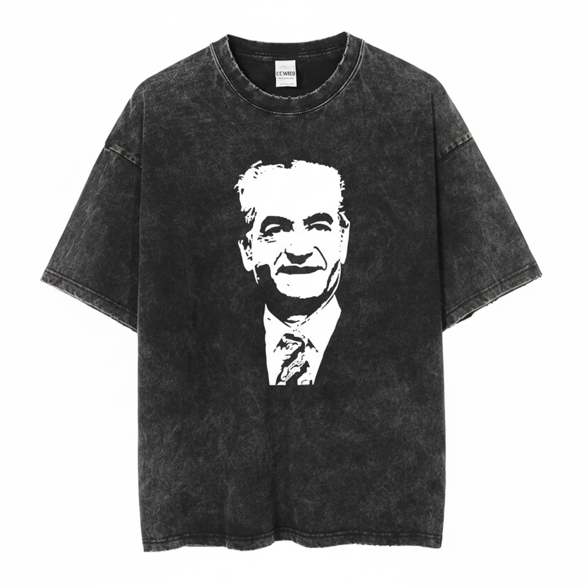 Black t-shirt with a white graphic of SHAH's face on a white background