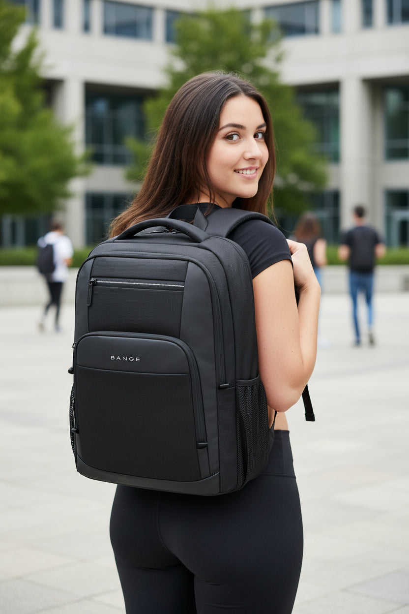 Black backpack with USB port and smartphone charging illustration on a white background