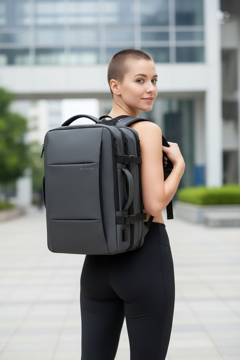 Gray backpack with measurement details on a white background