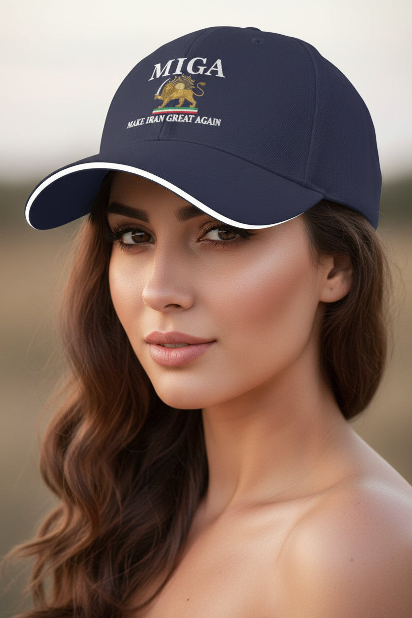 Woman wearing a navy blue cap with 'MIGA' branding against a blurred natural background